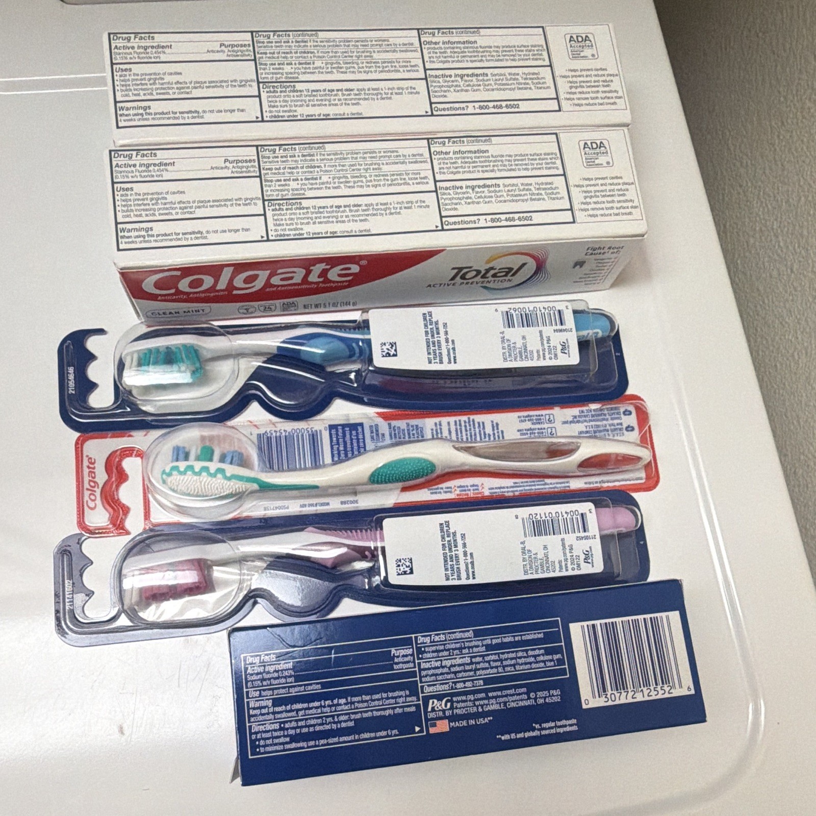 Colgate Total Clean Mint & Crest 3D White Arctic Fresh + Oral-B Toothbrush Lot