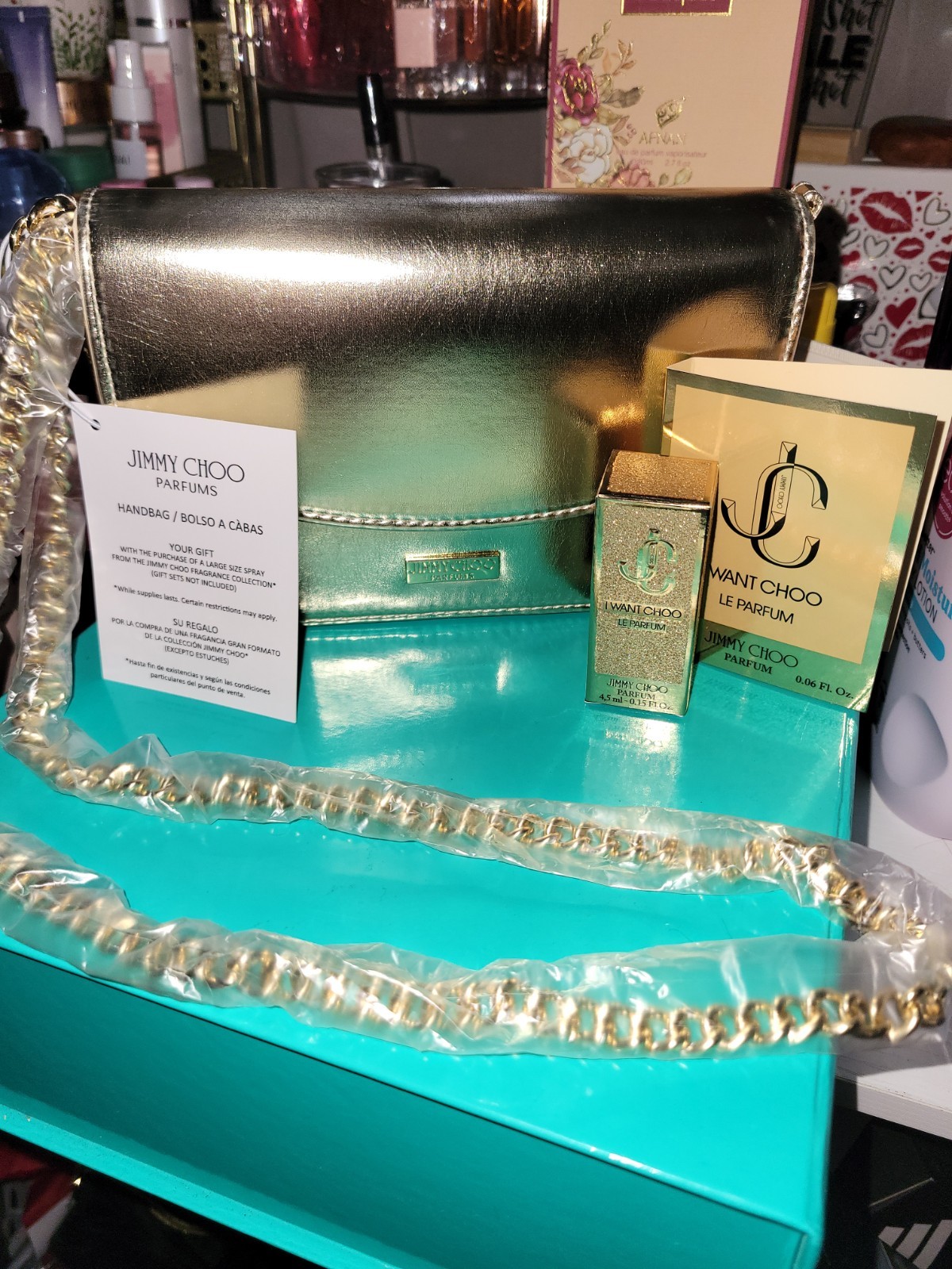 Jimmy Choo I Want Choo Le Parfum Miniature with exclusive Gold handbag.