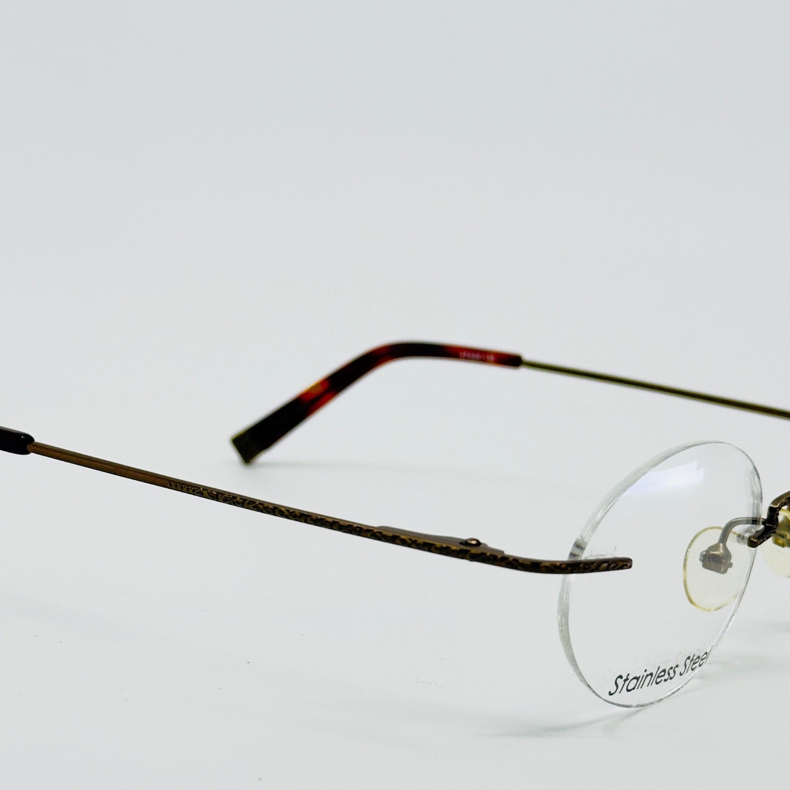 NEW NATURALLY RIMLESS NR-143 BRZ Bronze Rimless Eyeglasses N/A-20-135 B:N/A