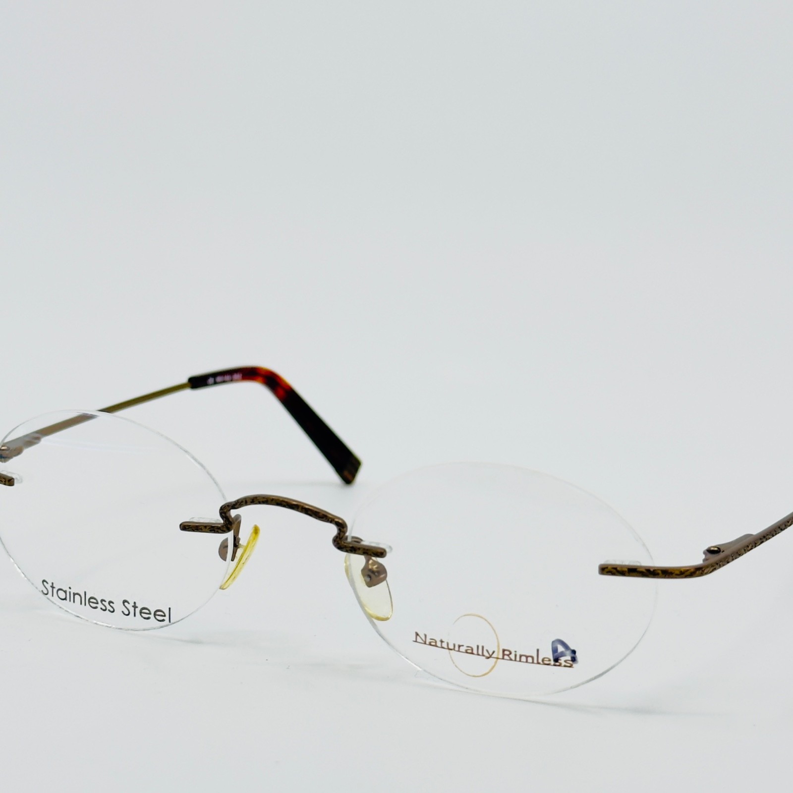 NEW NATURALLY RIMLESS NR-143 BRZ Bronze Rimless Eyeglasses N/A-20-135 B:N/A