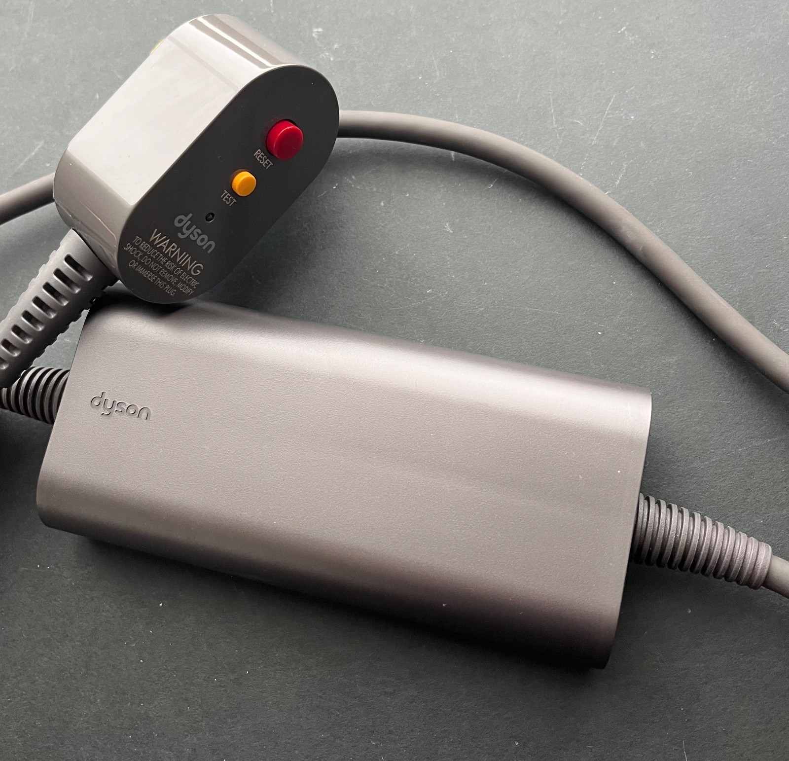 The Dyson Airstrait straightener dries and straightens hair simultaneously.